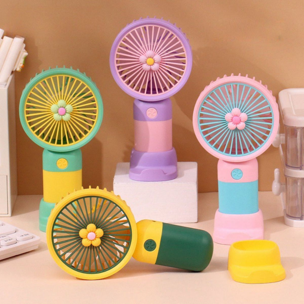 Kipas Angin Genggam Tangan Motif Bunga 2in1 + Holder Penyangga HP / Handy Mini Fan Portable Rechargeable Elektrik Karakter Lucu Travel Size Travelling Outdoor Konser Piknik Pantai Jogging CFD Jalan Luar Ruangan Make Up Skincare Kamar Emergency Multifungsi